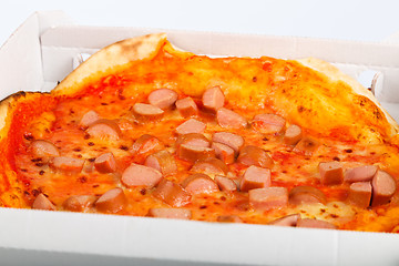 Image showing Takeaway Italian pizza with hot dog