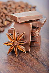 Image showing The milk chocolate, coffee beans and anise