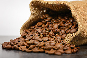 Image showing Studio shot of coffee beans in a bag