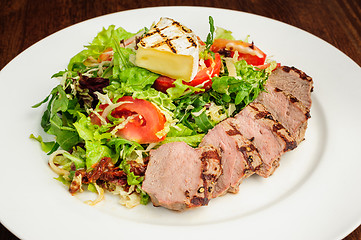 Image showing Veal meat with fresh vegetable salad