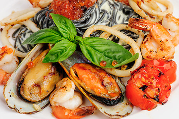 Image showing Black Pasta with sea food and basil