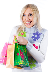 Image showing Pretty smiling girl with shopping bags