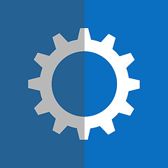 Image showing White gearwheel on blue background