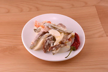 Image showing Healthy salad with fresh vegetables on wooden background