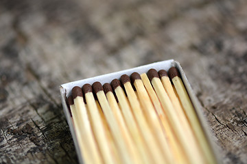 Image showing wooden matches in a box, close up