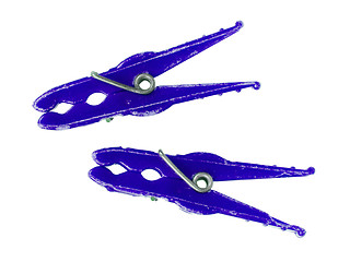 Image showing Two old blue clothespins 