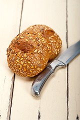 Image showing organic bread over rustic table