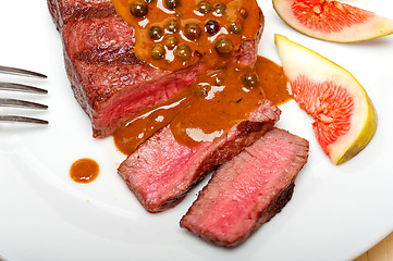 Image showing green peppercorn beef filet mignon