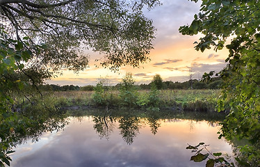 Image showing Colourful sunset over the river