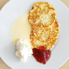 Image showing Pancakes with vanilla sauce, cream and jam