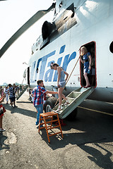 Image showing People exploring the MI-26T helicopter