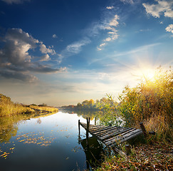 Image showing Old pier on autumn river