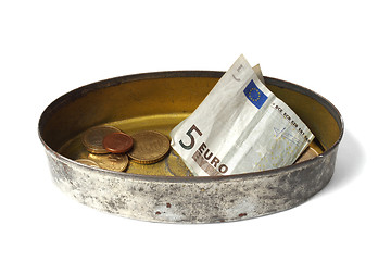 Image showing Tin can with money