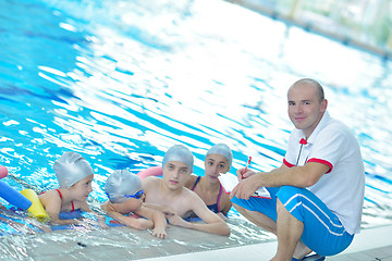 Image showing children group  at swimming pool