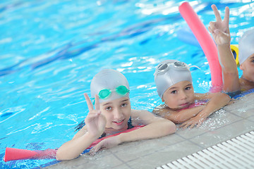 Image showing children group  at swimming pool