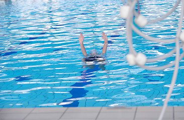 Image showing help and rescue on swimming pool