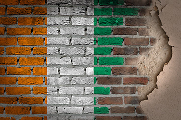 Image showing Dark brick wall with plaster - Ivory Coast