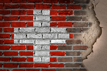 Image showing Dark brick wall with plaster - Switzerland