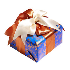 Image showing blue gift packing tied by ribbon