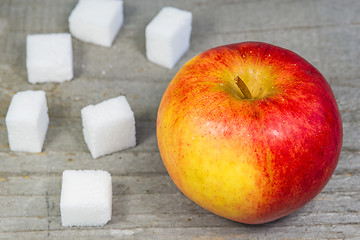 Image showing apple and lump sugar