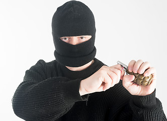 Image showing Masked man with grenade