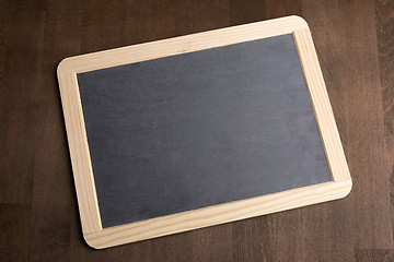 Image showing Writing tablet on a brown background