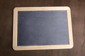 Image showing Writing tablet on a brown background