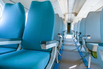 Image showing Interior of an airplane with many seats