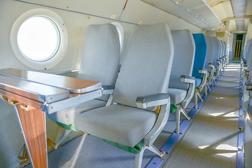 Image showing Interior of an airplane with many seats
