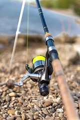 Image showing Modern clean fishing rod outdoors