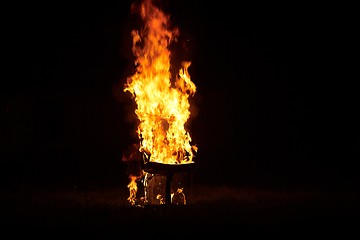 Image showing Chair on Fire burning in the night