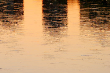 Image showing Close up of sunset water reflection