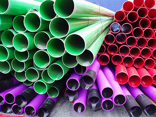 Image showing Stacks of plastic pipes