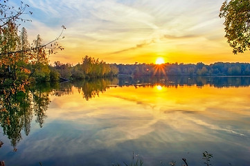 Image showing Autumn sunset on the lake