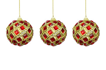 Image showing Toys for the Christmas tree, red-yellow balls on a white backgro