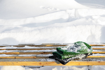 Image showing snow-covered bench