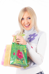 Image showing Pretty smiling girl with shopping bags