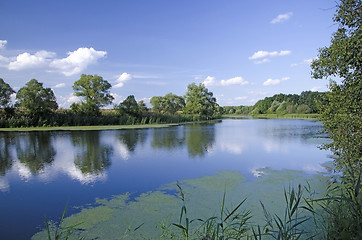 Image showing Landscape with clouds reflecting in the river
