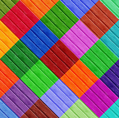 Image showing Colorful Diamond Shapes on Wooden Surface