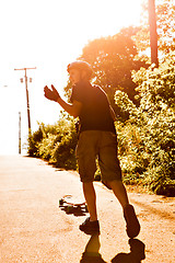 Image showing Longboarding Teen Silhouette