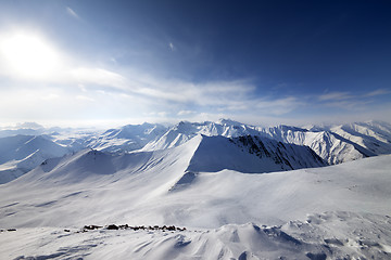 Image showing Off-piste slope and sky with sun