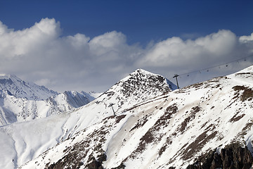 Image showing Off-piste slope and chair-lift in little snow year