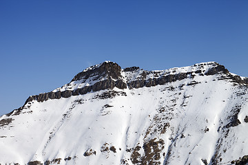 Image showing Snowy rocks with traces of avalanches
