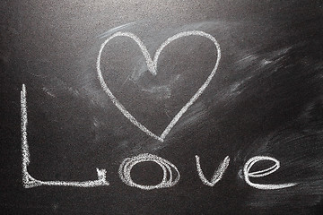 Image showing Love heart drawing on a school chalkboard 