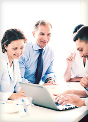 Image showing businessman with team on meeting in office