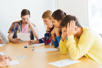 Image showing group of students with papers