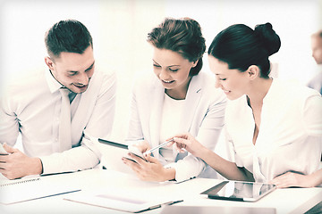 Image showing business team working with tablet pcs in office