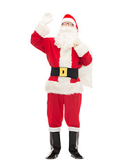 Image showing man in costume of santa claus with bag