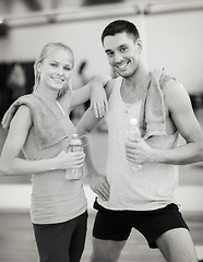 Image showing two smiling people in the gym