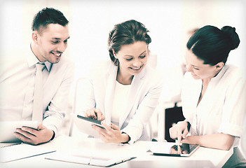 Image showing business team working with tablet pcs in office